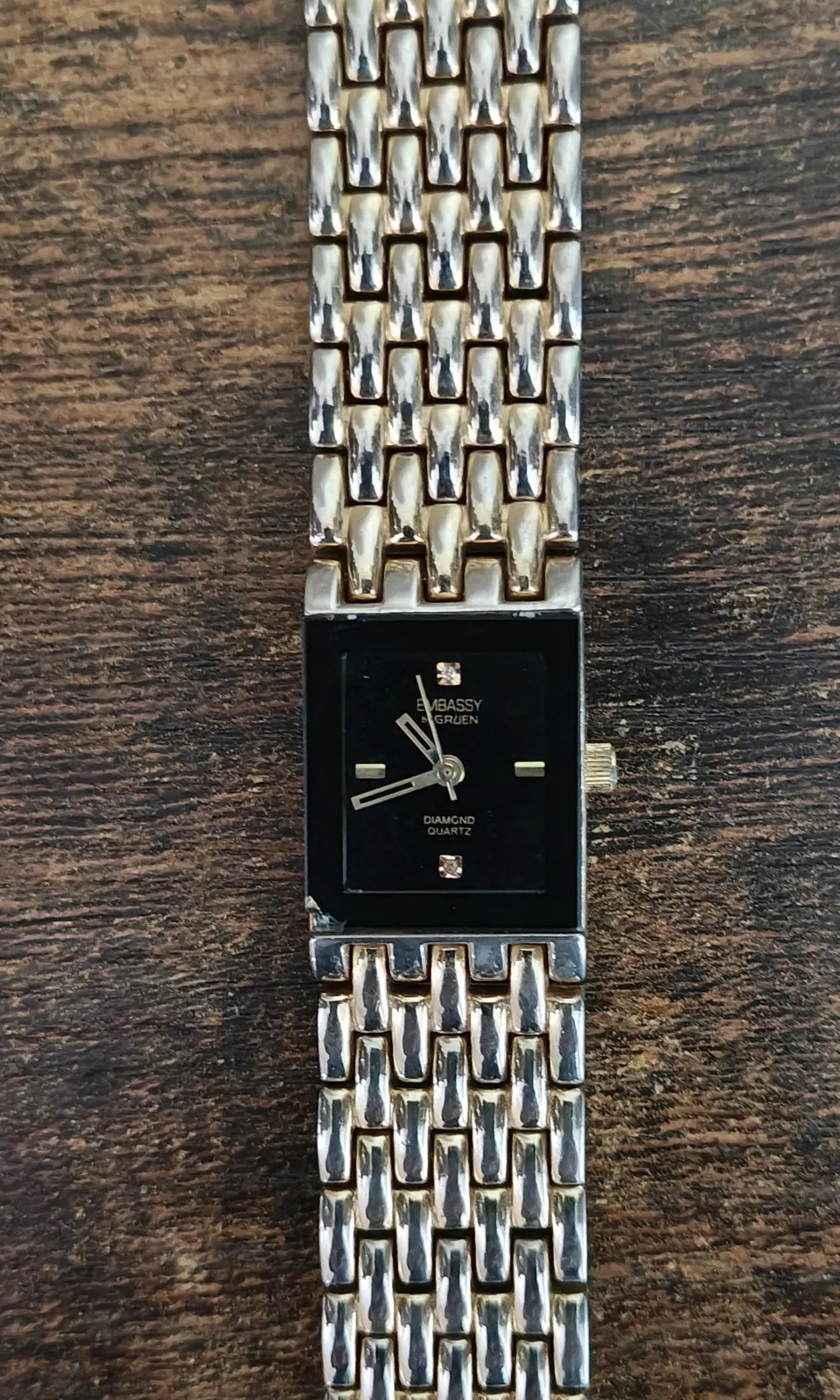 1990s Embassy by Gruen Gold Tone With Black Dial Ladies Diamond Accent Watch