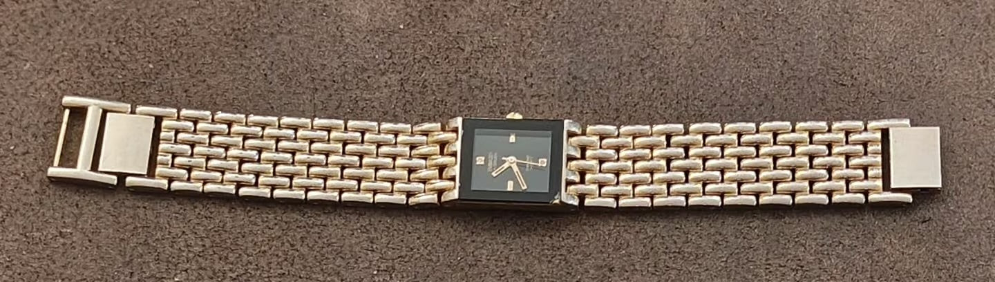 1990s Embassy by Gruen Gold Tone With Black Dial Ladies Diamond Accent Watch