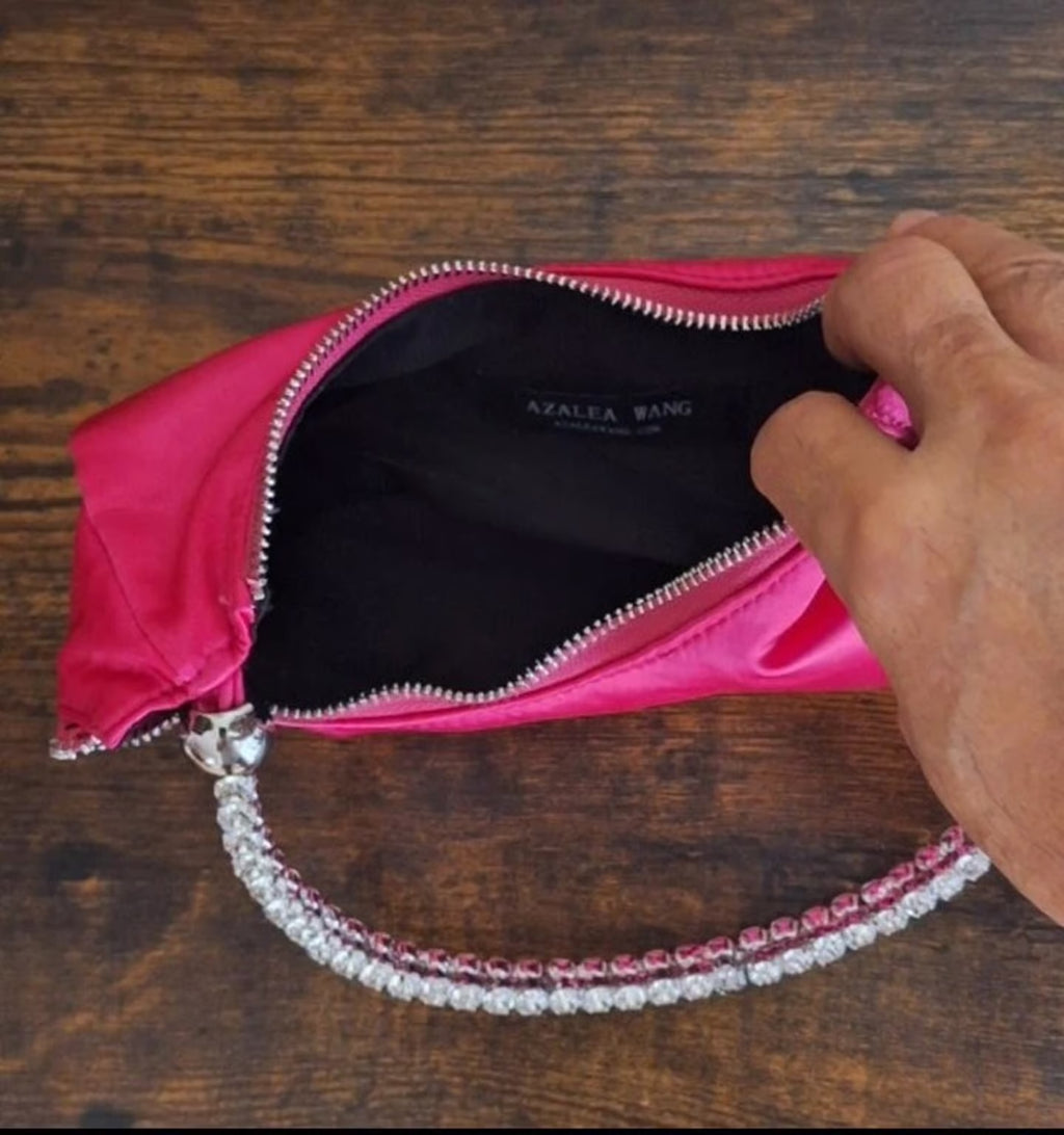 Azalea Wang pink satin zip handbag with rhinestone strap and black fabric interior
