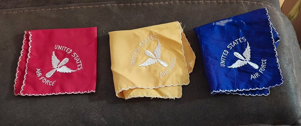 Embroidered souvenir handkerchief set: red, cream, and blue squares with Air Force wing embroidery