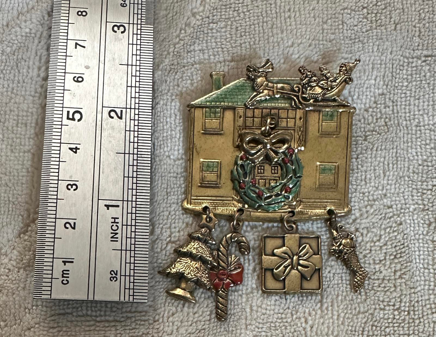 1980’s Christmas-themed House Brooch with dangling charms