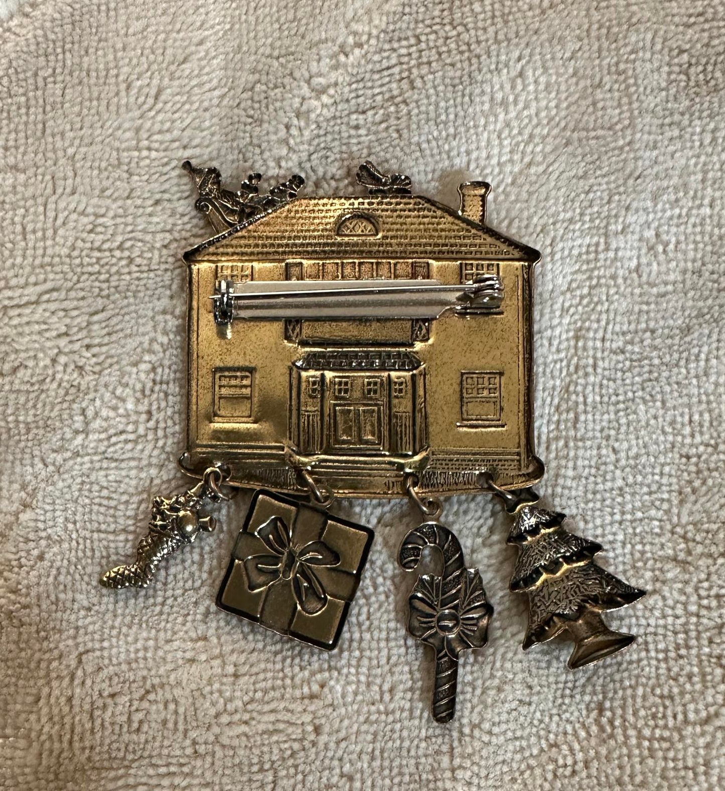 1980’s Christmas-themed House Brooch with dangling charms