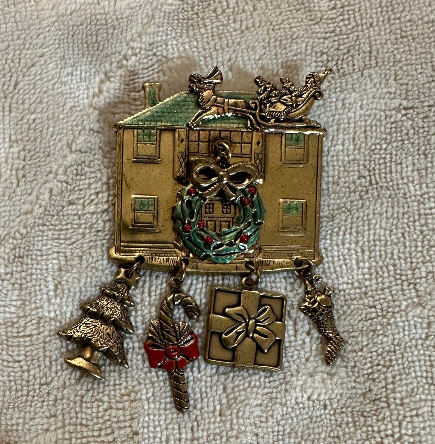1980’s Christmas-themed House Brooch with dangling charms