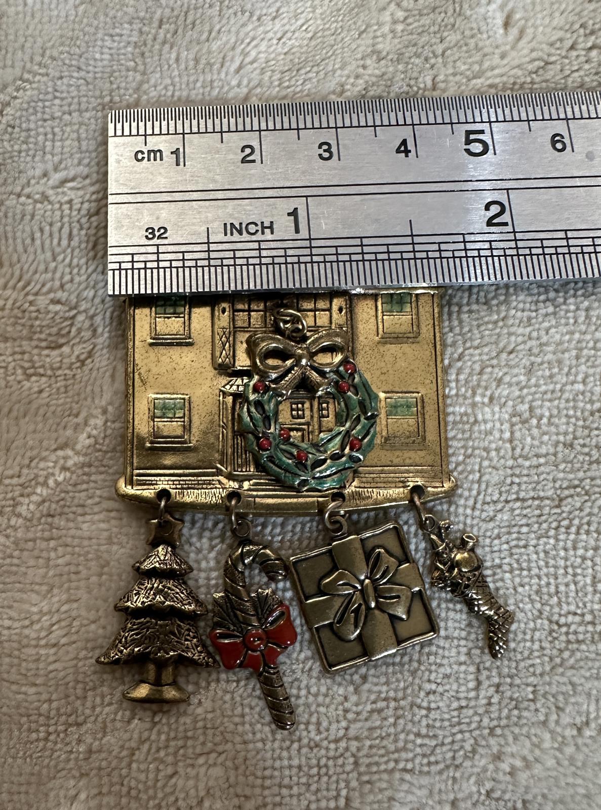 1980’s Christmas-themed House Brooch with dangling charms