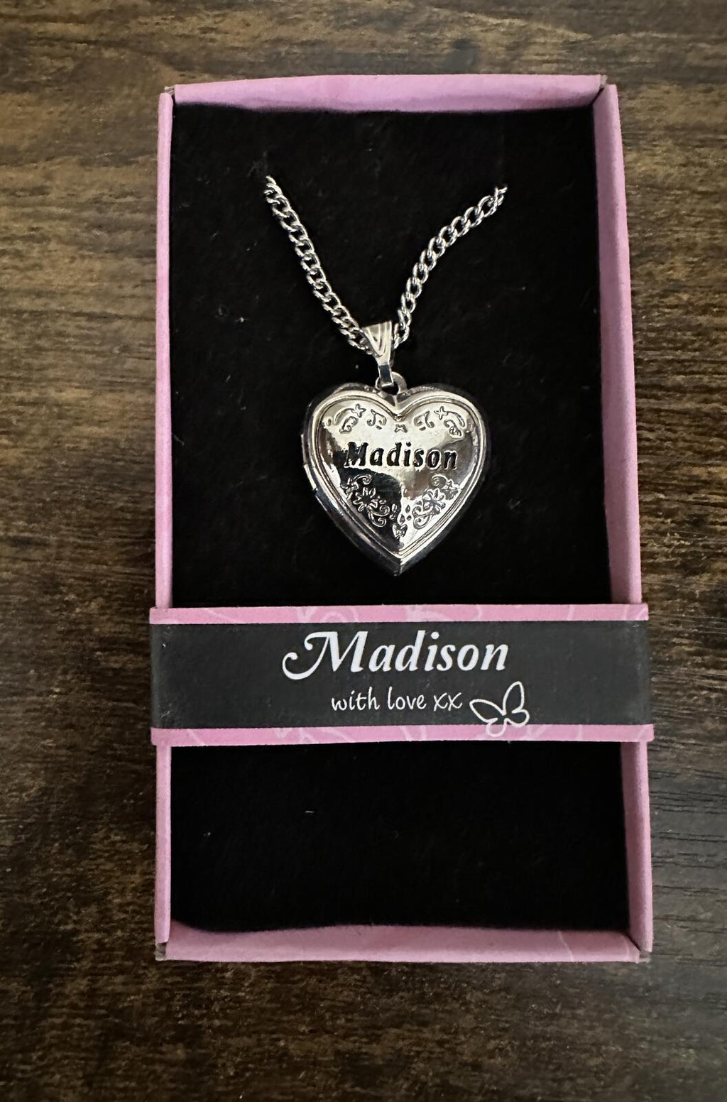 Silver-tone heart locket necklace with engraved “Madison” charm and chain