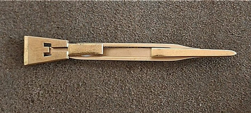 Gold-tone sword-style tie clip bar with letter E monogram, side view