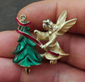 Enamel angel and Christmas tree brooch pin with red accents and gold-tone figures