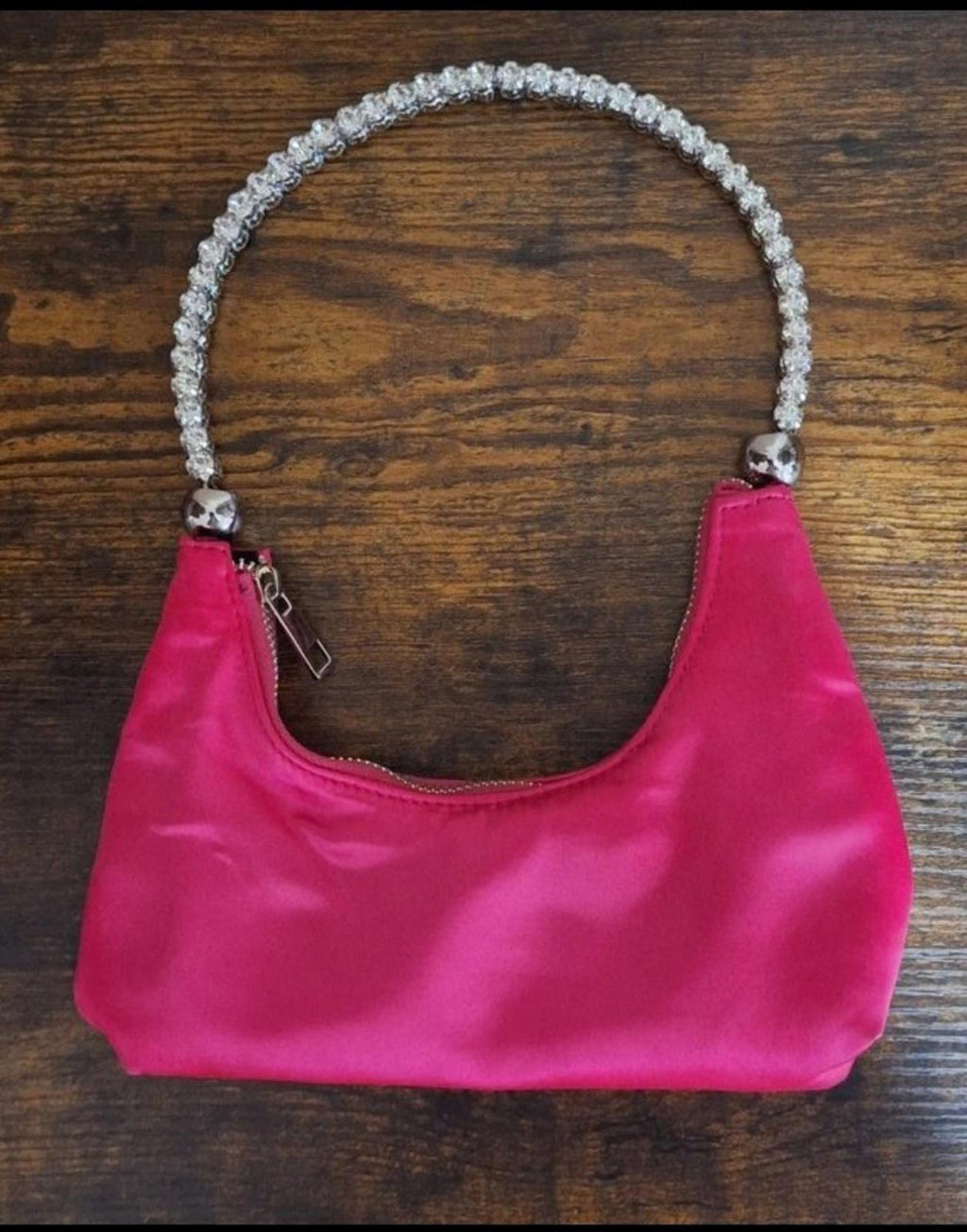 Pink satin shoulder bag with rhinestone beaded top handle and small side zipper