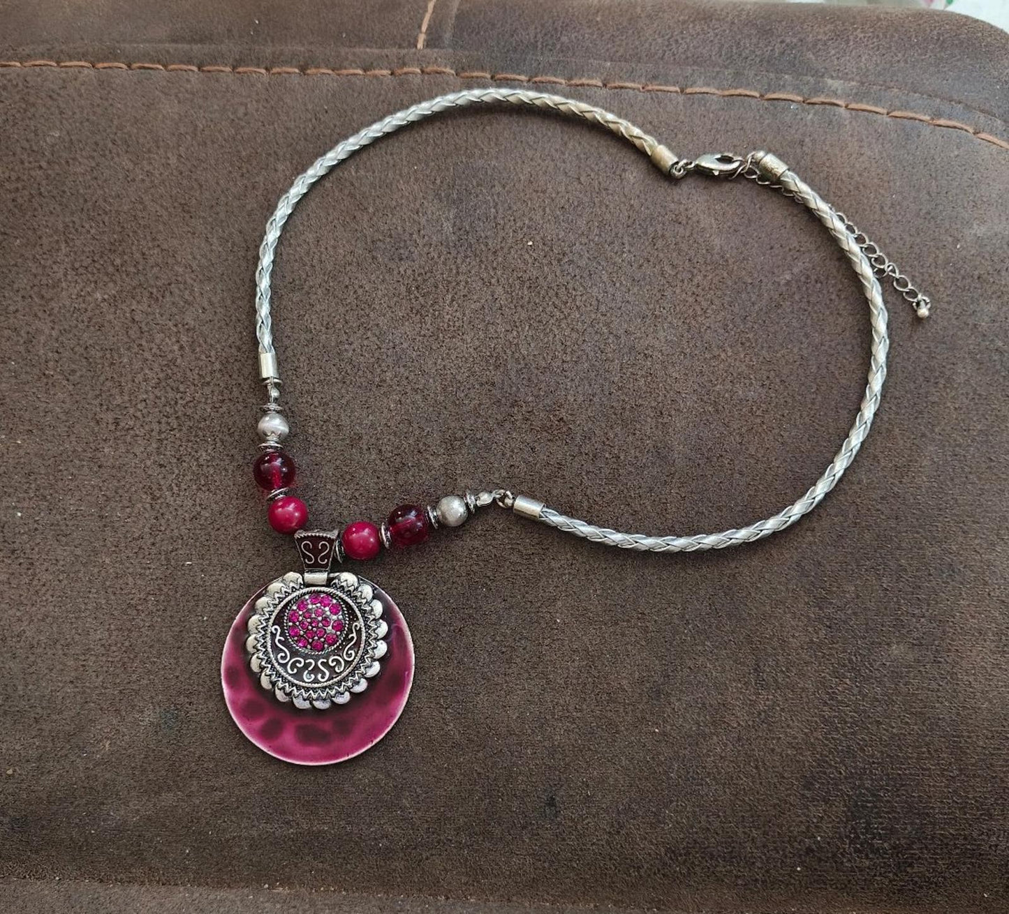 Silver Tone Braided Plastic Chain With Round Burgundy Pendant and Beaded Accents