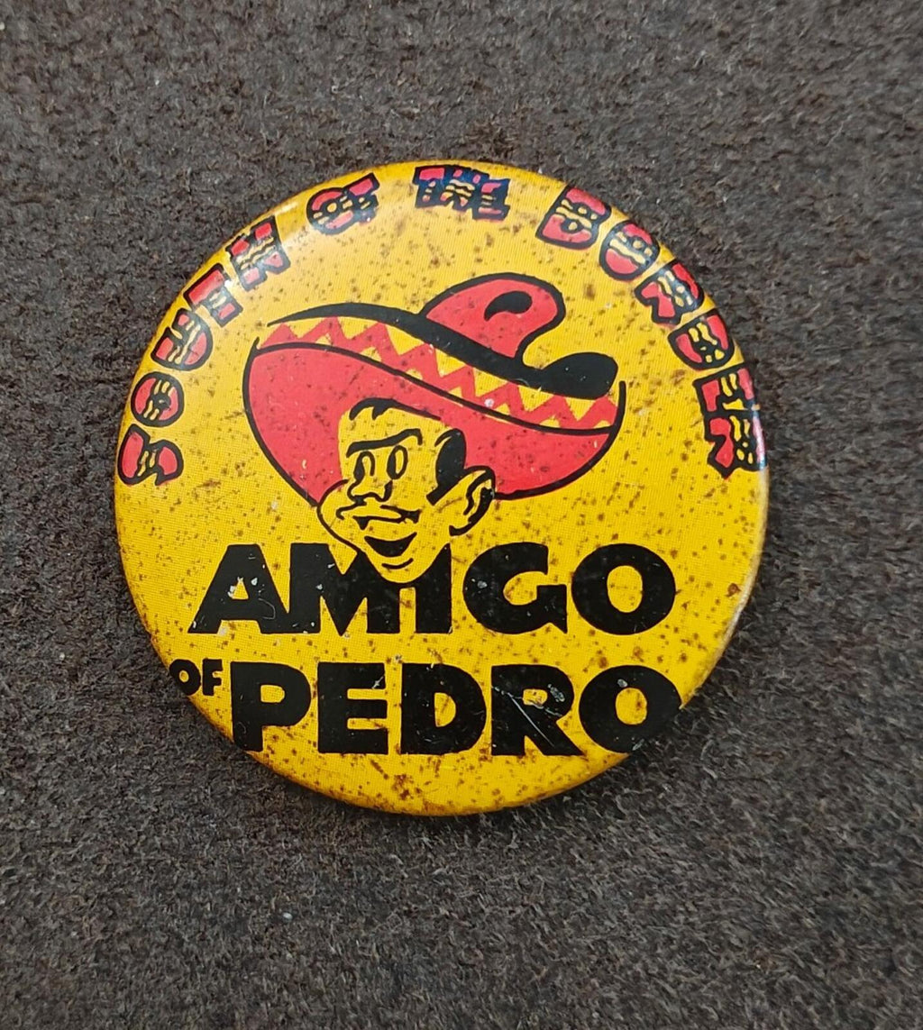 Yellow AMIGO OF PEDRO pinback button with sombrero mascot graphic, full front view