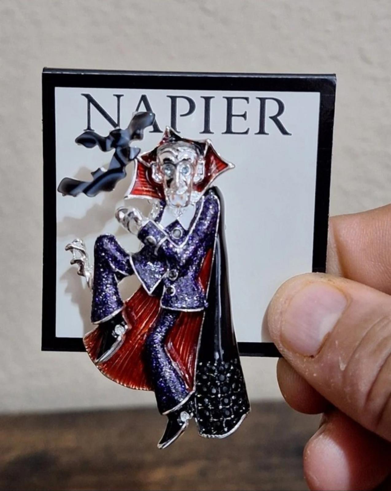 Vampire enamel character pin with red-black cape and blue-purple glitter vest
