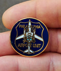 Blue and gold enamel Philadelphia Police Airport Unit round lapel pin with airplane badge
