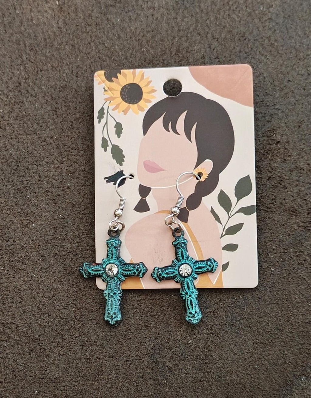 Turquoise cross earrings with rhinestone centers, silver-tone ear wires, paired dangles