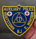 Embroidered blue police auxiliary patch with yellow border, Highstown NJ, E. Windsor