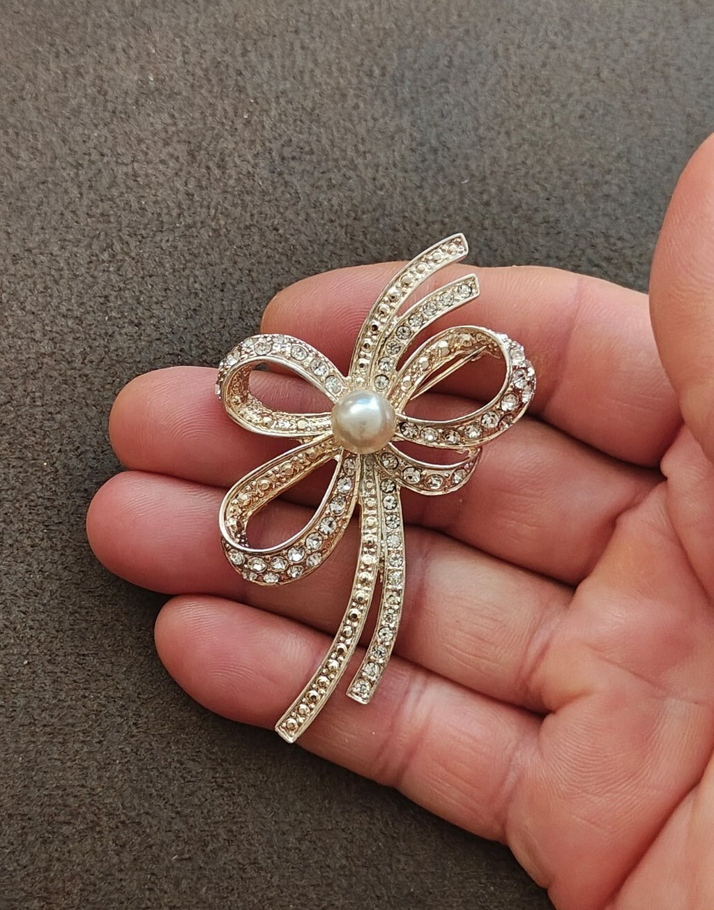 1980s Silver Tone Ribbon Bow With Clear Rhinestones & Large Faux Pearl Brooch