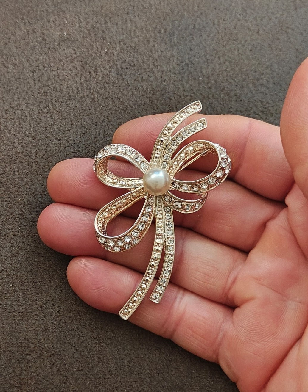 1980s Silver Tone Ribbon Bow With Clear Rhinestones & Large Faux Pearl Brooch