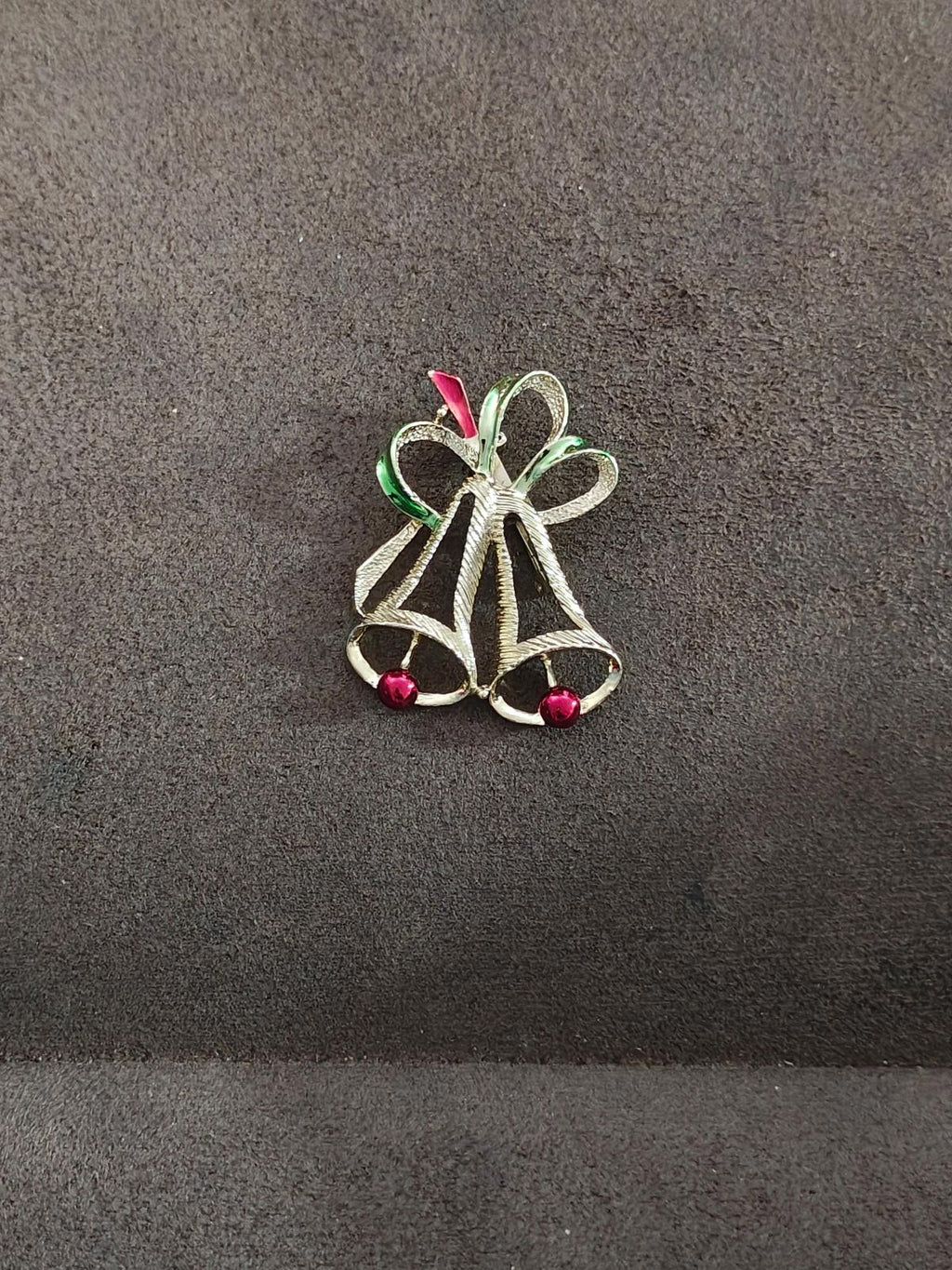Gold-tone Christmas bells brooch pin with green and red enamel ribbon accents