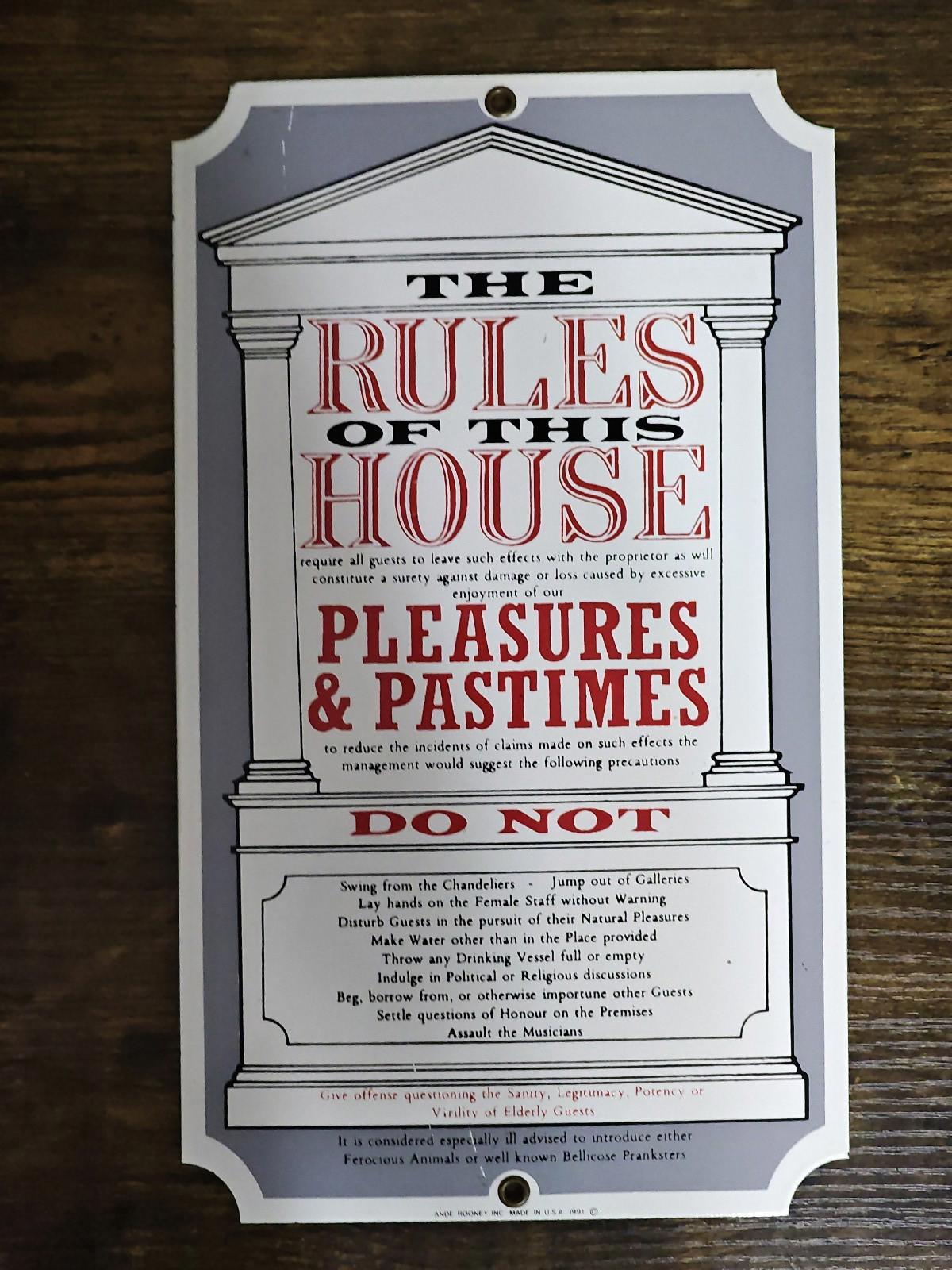1991 Ande Rooney "The Rules of This House" Porcelain Enamel Metal Sign