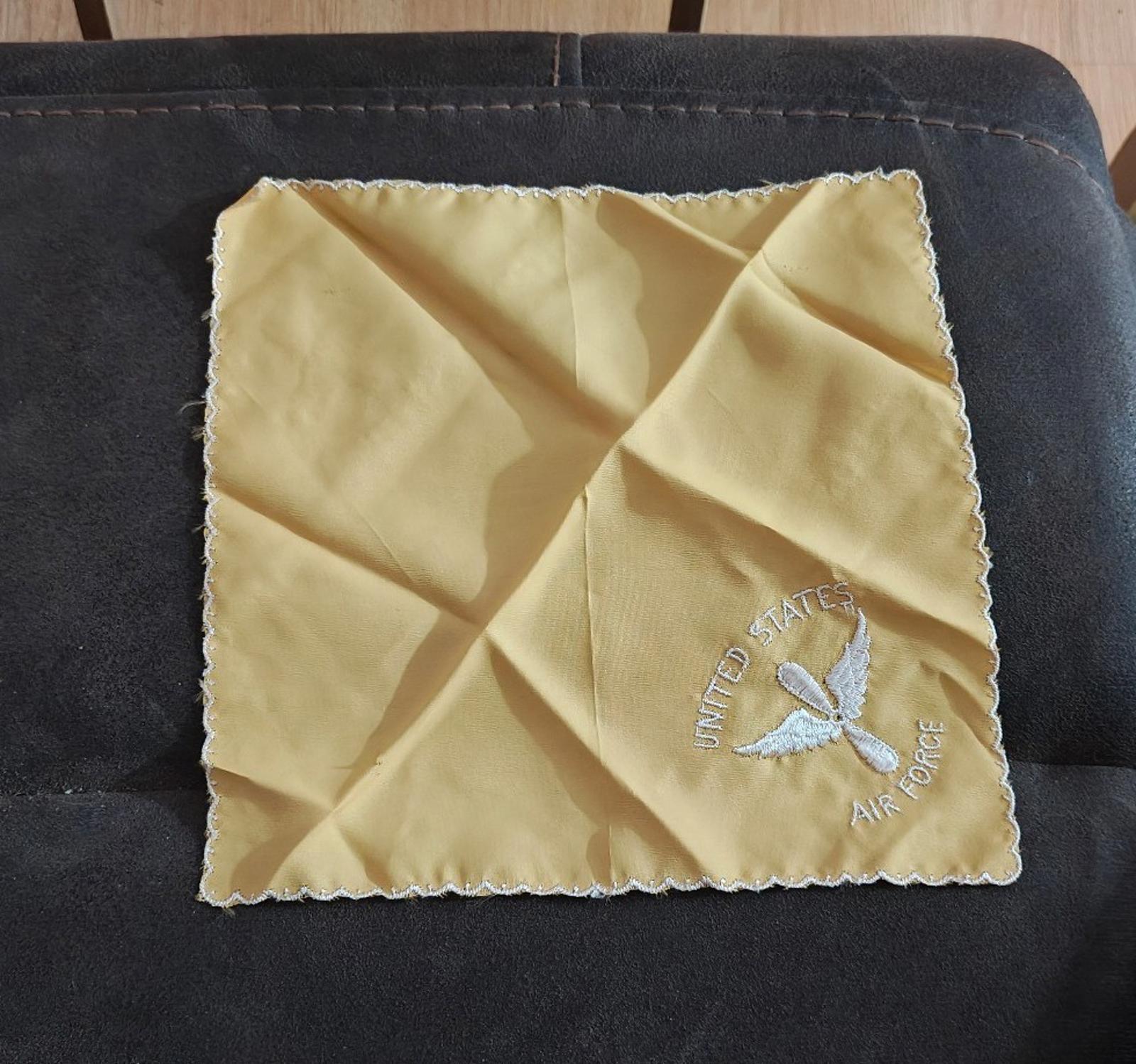 Cream embroidered handkerchief square with white scalloped trim and Air Force emblem
