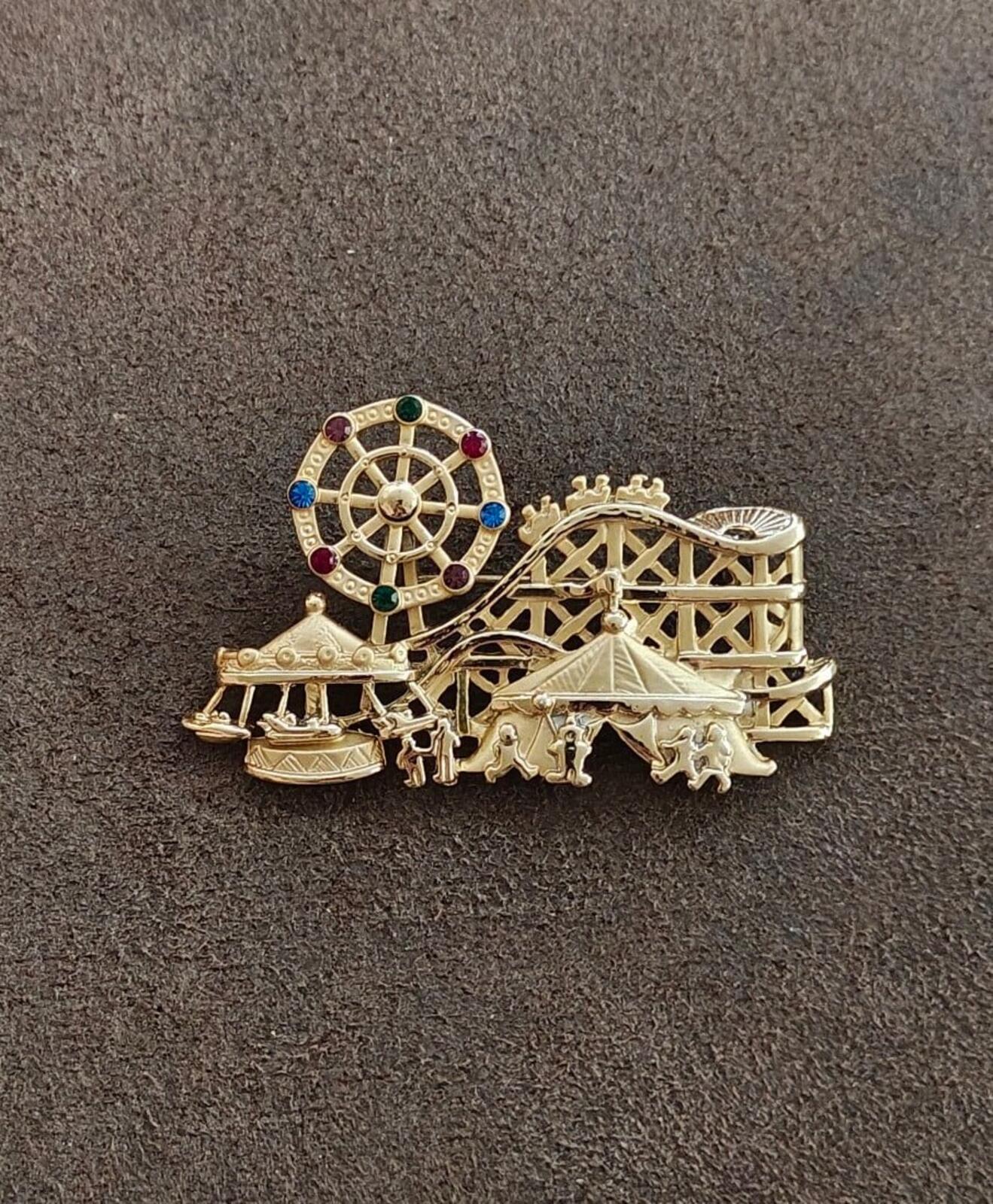 1980s Signed AJC Carnival Themed Gold Tone Brooch.