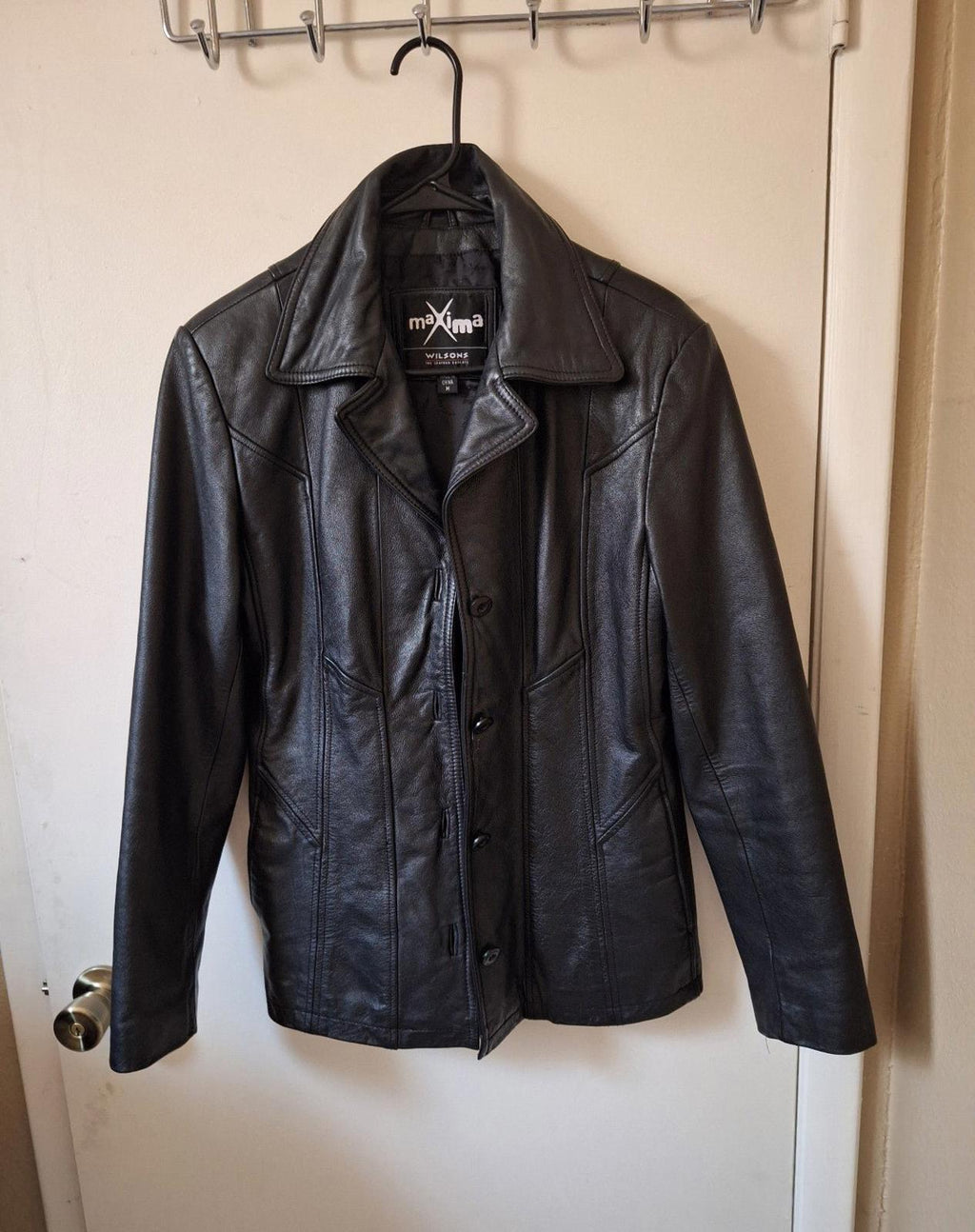 Women's Wilson's Maxima black leather jacket with button placket and stand collar