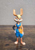 Lola Bunny Space Jam figurine in blue overalls and orange tank, standing pose.