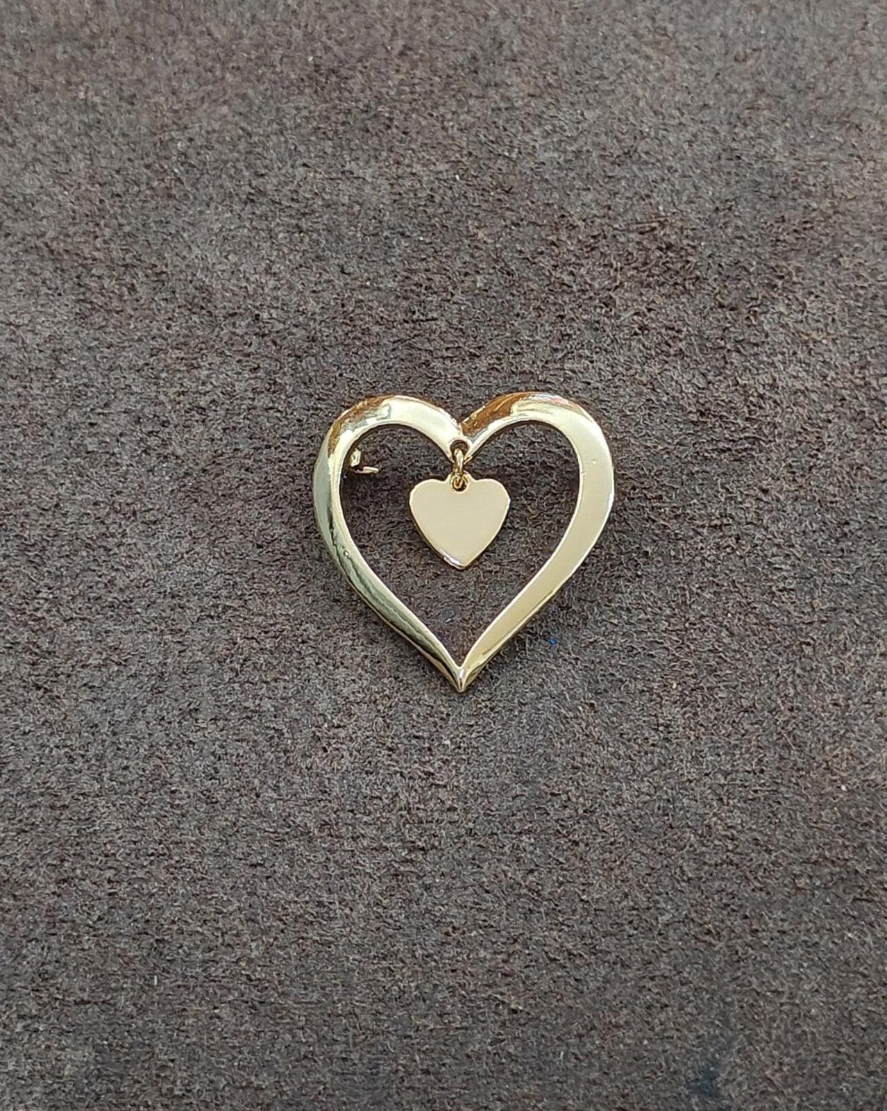 1980s Gold Tone Open Heart With a Smaller Heart Charm Dangle Brooch