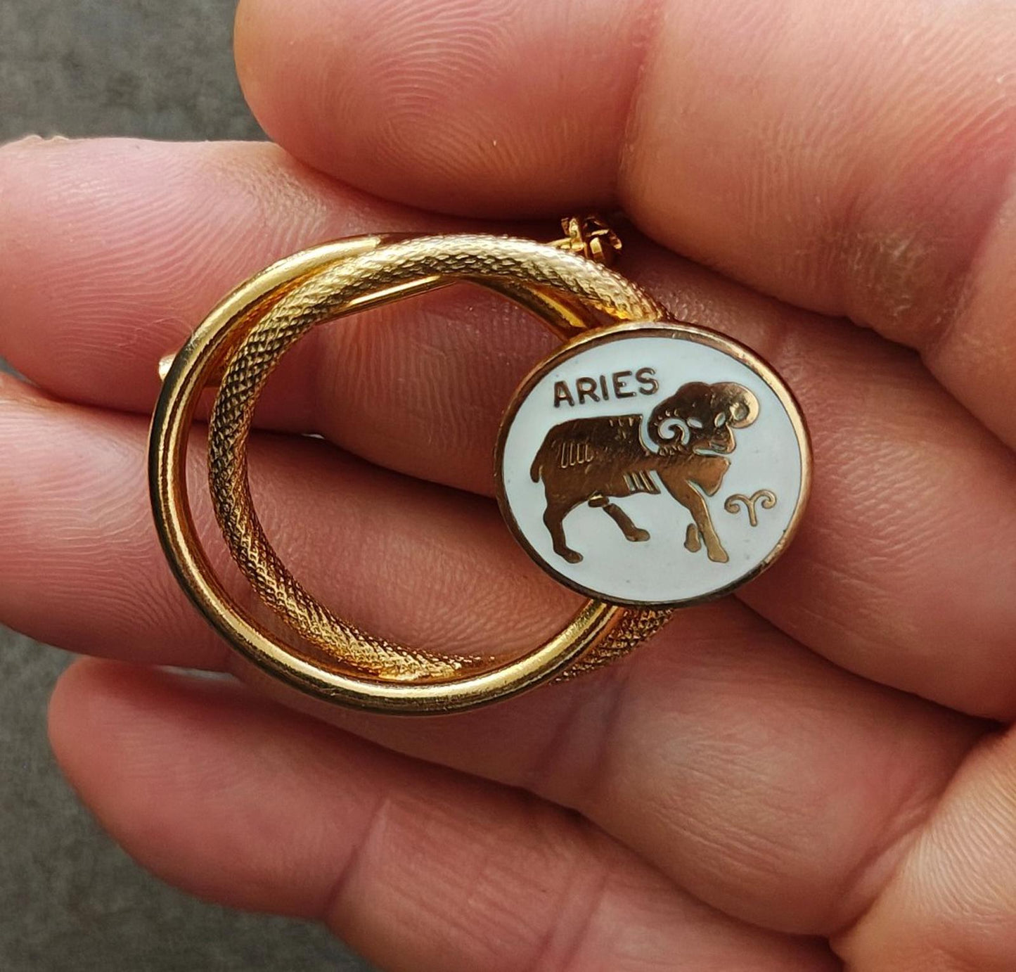 1970s Gold Tone Aries Zodiac Sign Double Circle White Enamel Brooch Pin