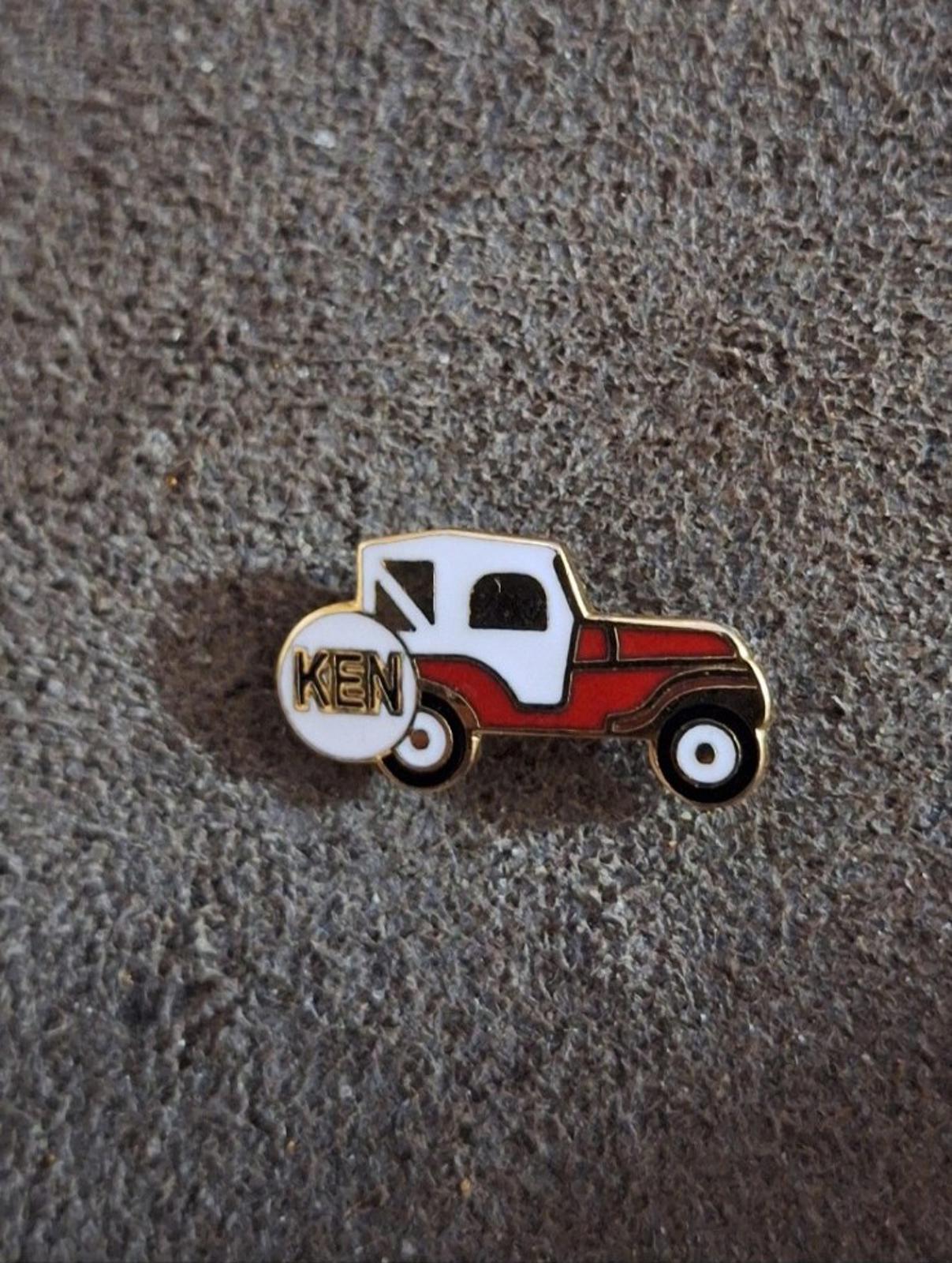1970s Gold Tone White & Red Jeep With Ken Name On Tire Enamel Pin