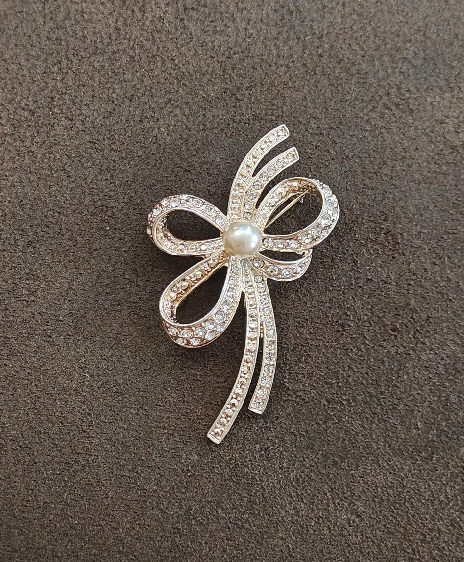 1980s Silver Tone Ribbon Bow With Clear Rhinestones & Large Faux Pearl Brooch