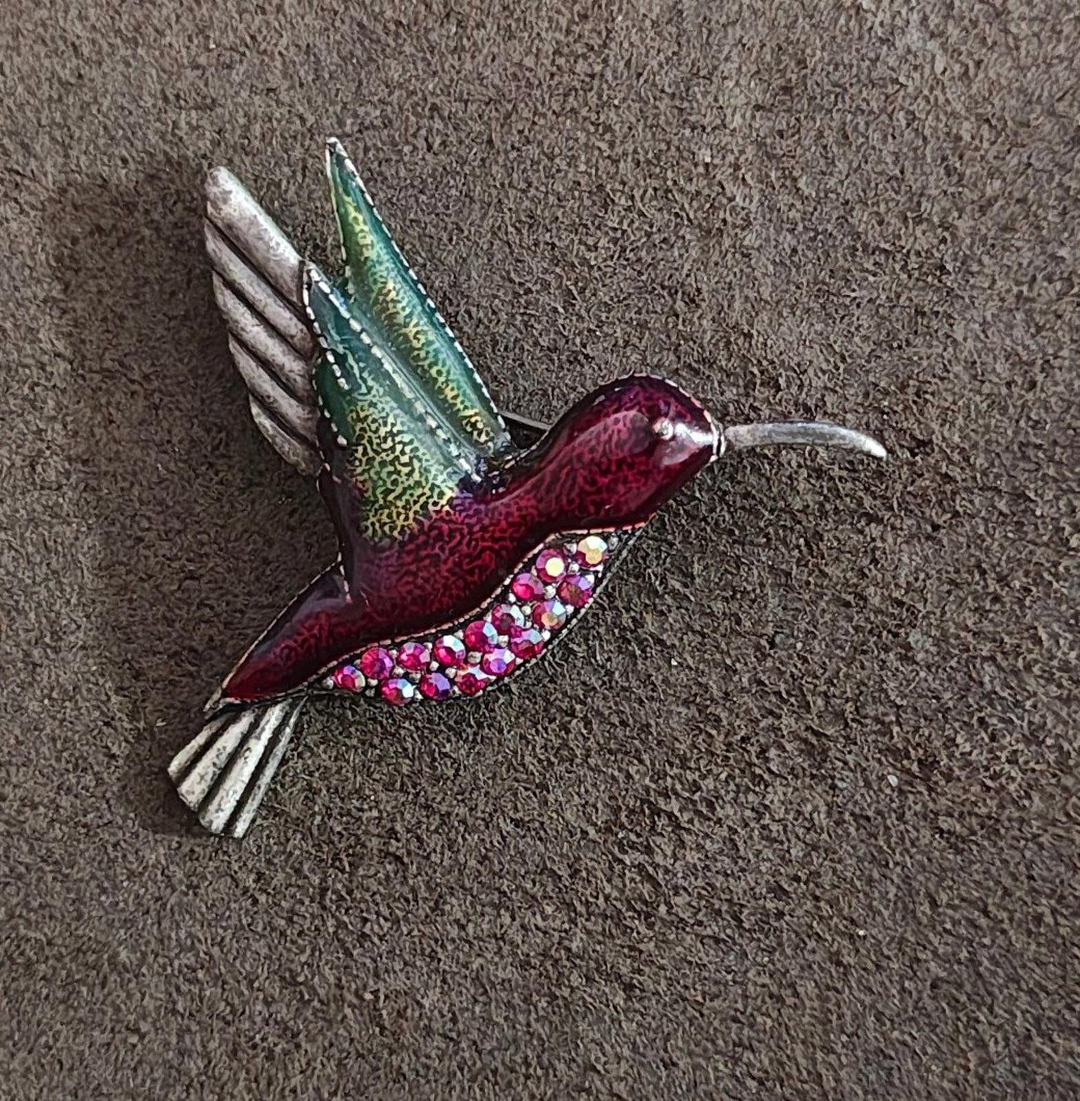 Hummingbird brooch pin with detailed wings in green and silver-tone enamel and rhinestones