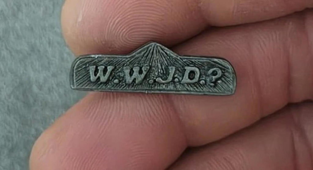 Pewter WWJD bar religious pin with raised lettering and cross detail