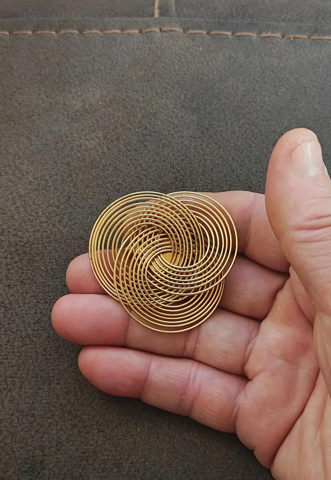 1970s Abstract Modernist Gold Tone Triple Ring Wire Spiral Brooch.