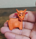 1960s Diener Industries Rubber Orange Cow Eraser Figurine