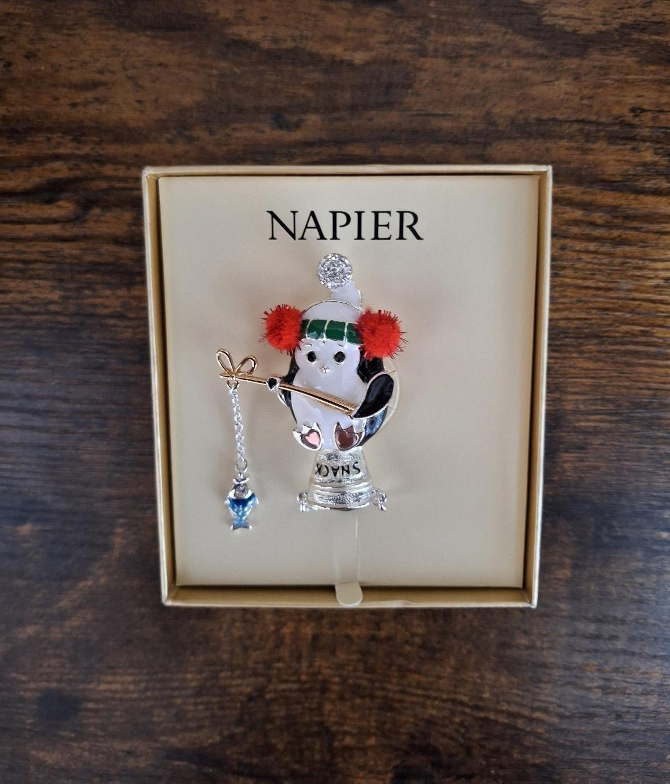 Napier silver-tone enamel penguin fishing pin in gift box, front view