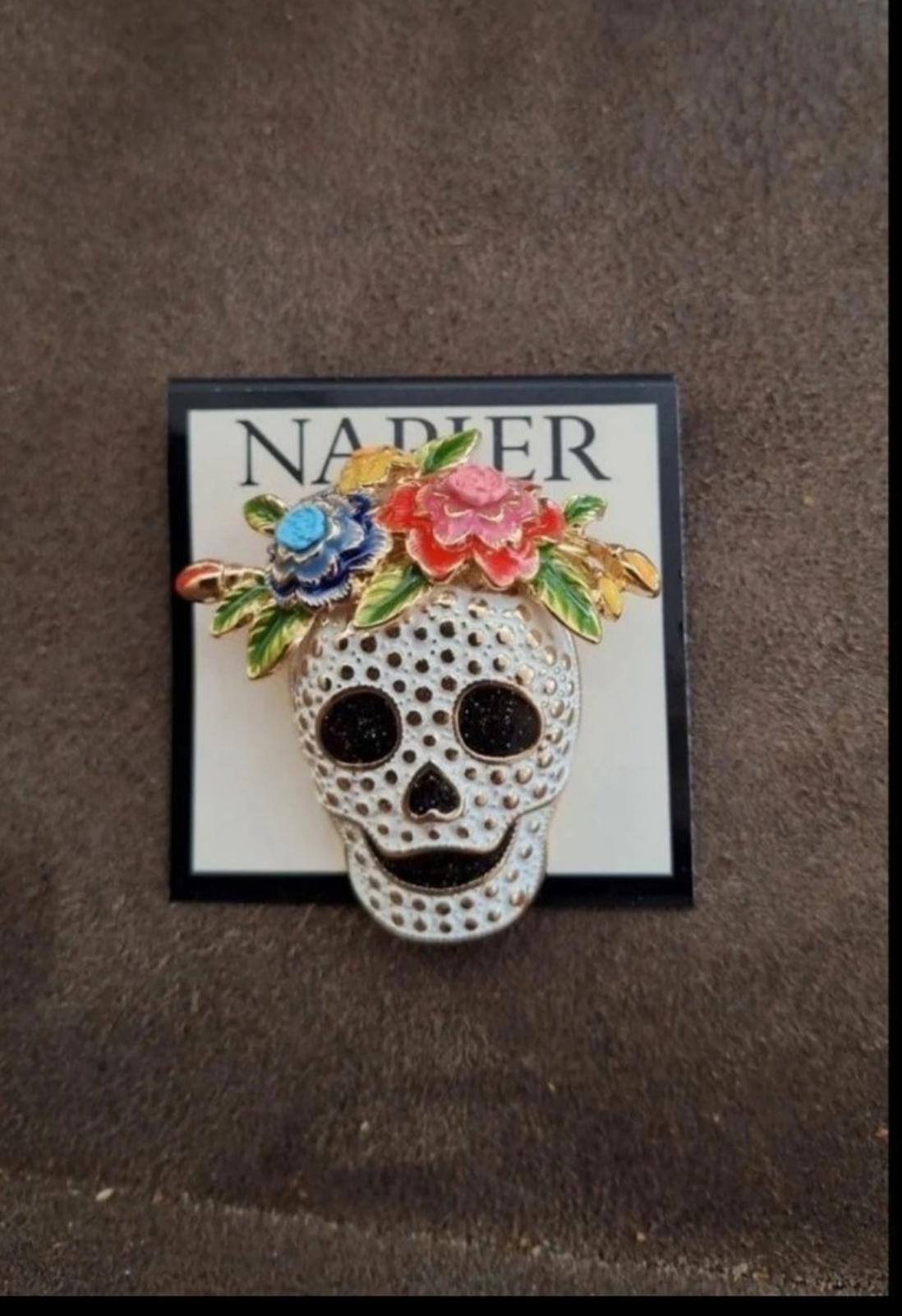 Silver tone sugar skull pin with multicolor floral crown and black eyes