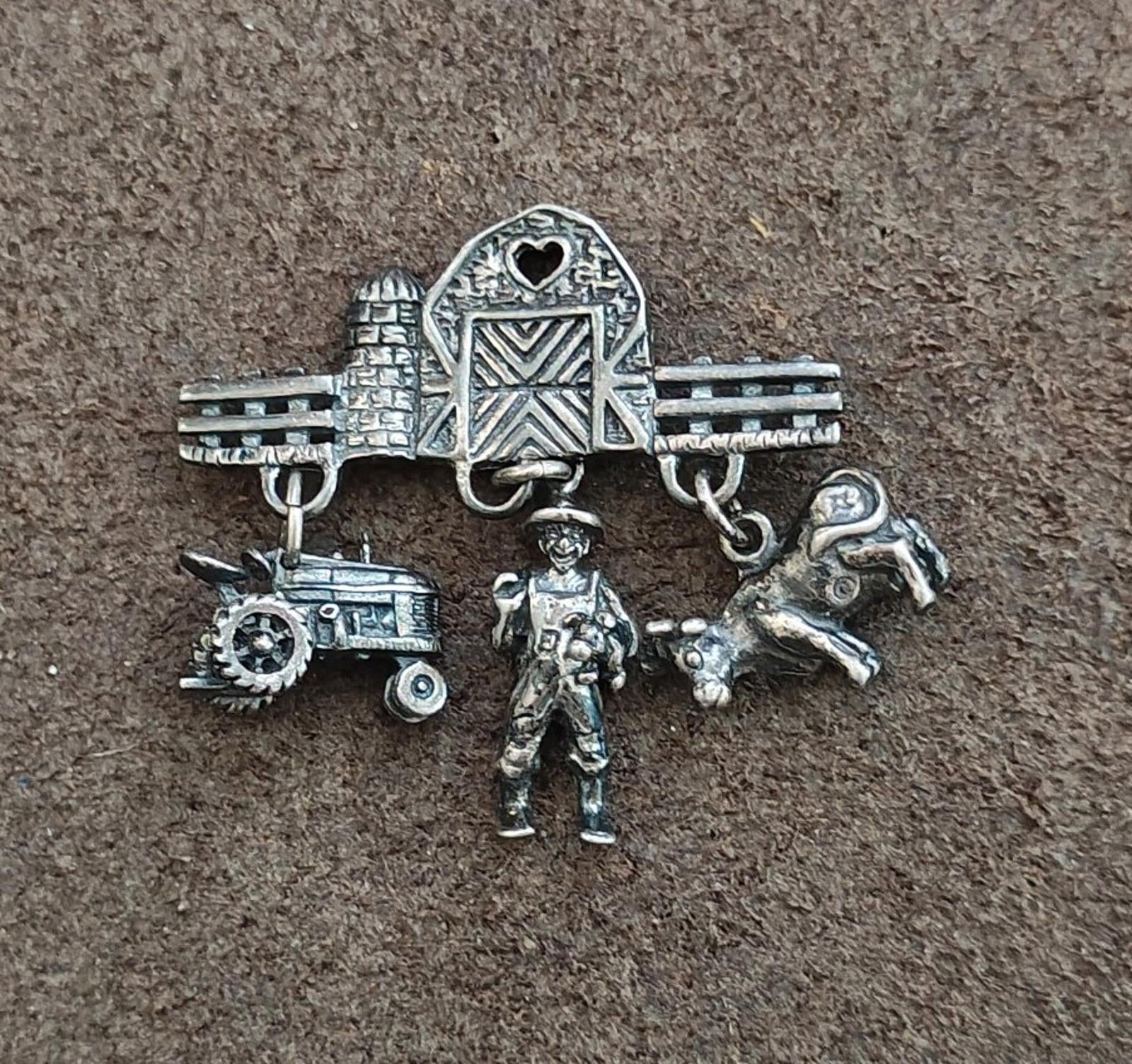 Antiqued sterling silver farm charm dangle pin with heart barn, farmer, tractor, and dog