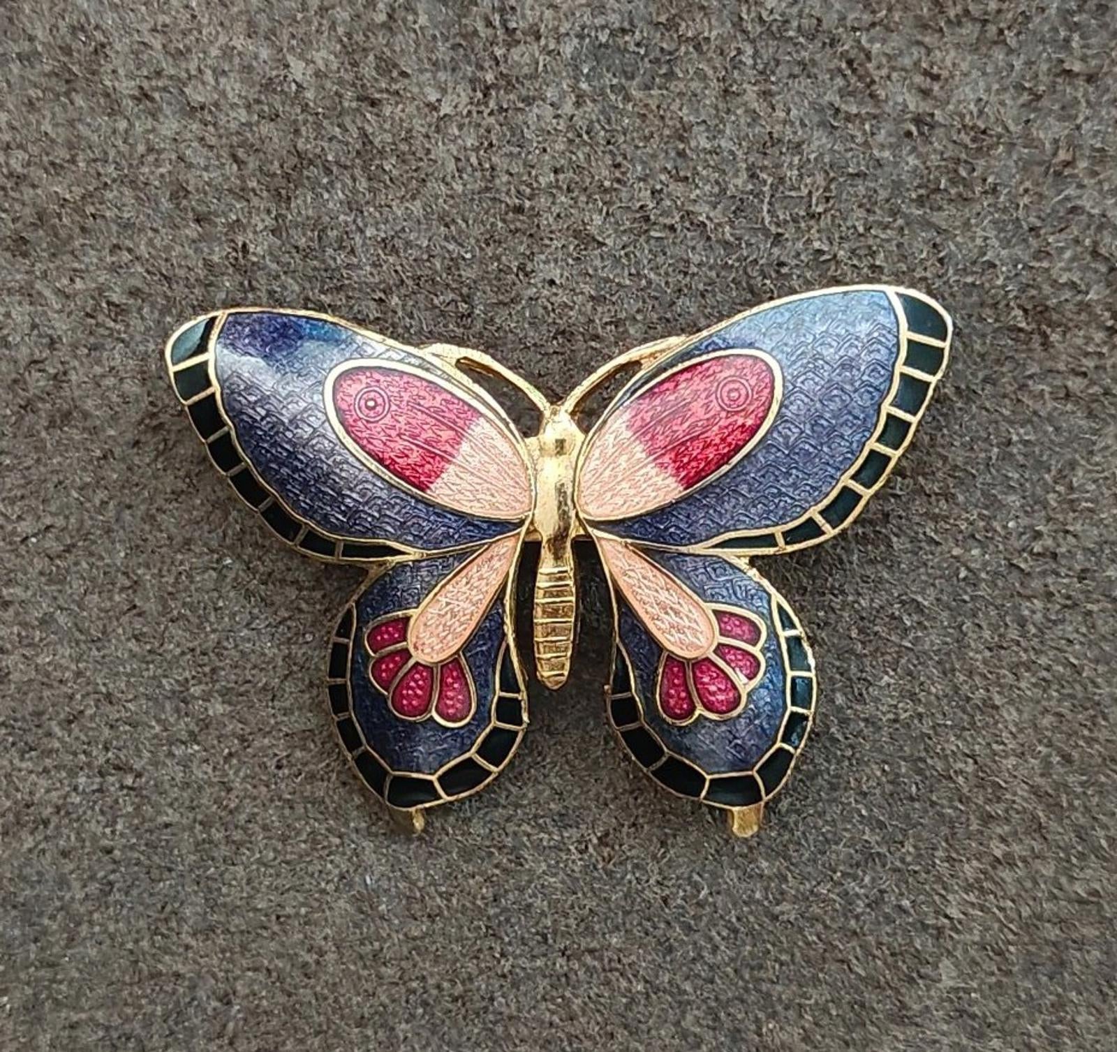 Butterfly enamel brooch, blue wing panels with red accents and gold-tone filigree