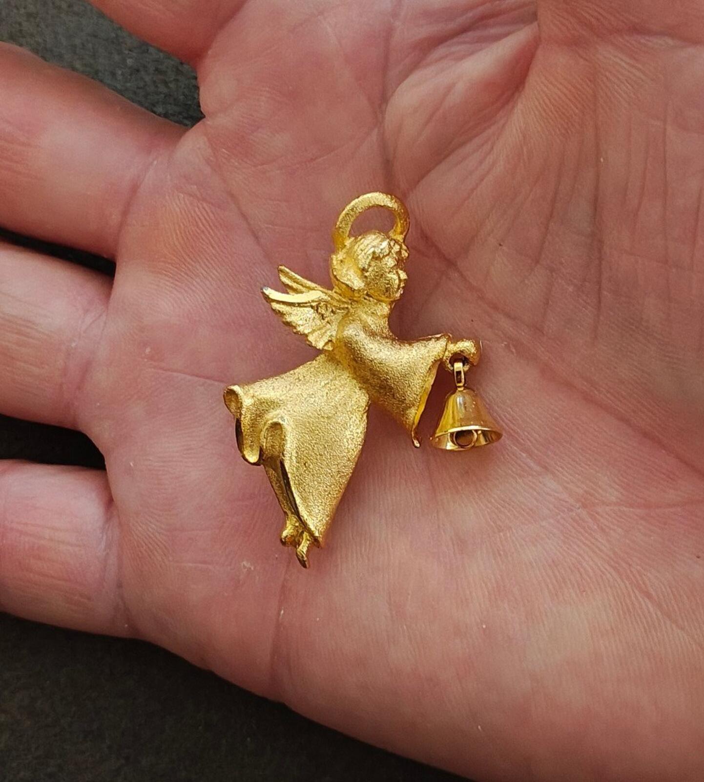 1980s Robyn Rush Angel With Bell Gold Tone Pin/Brooch.