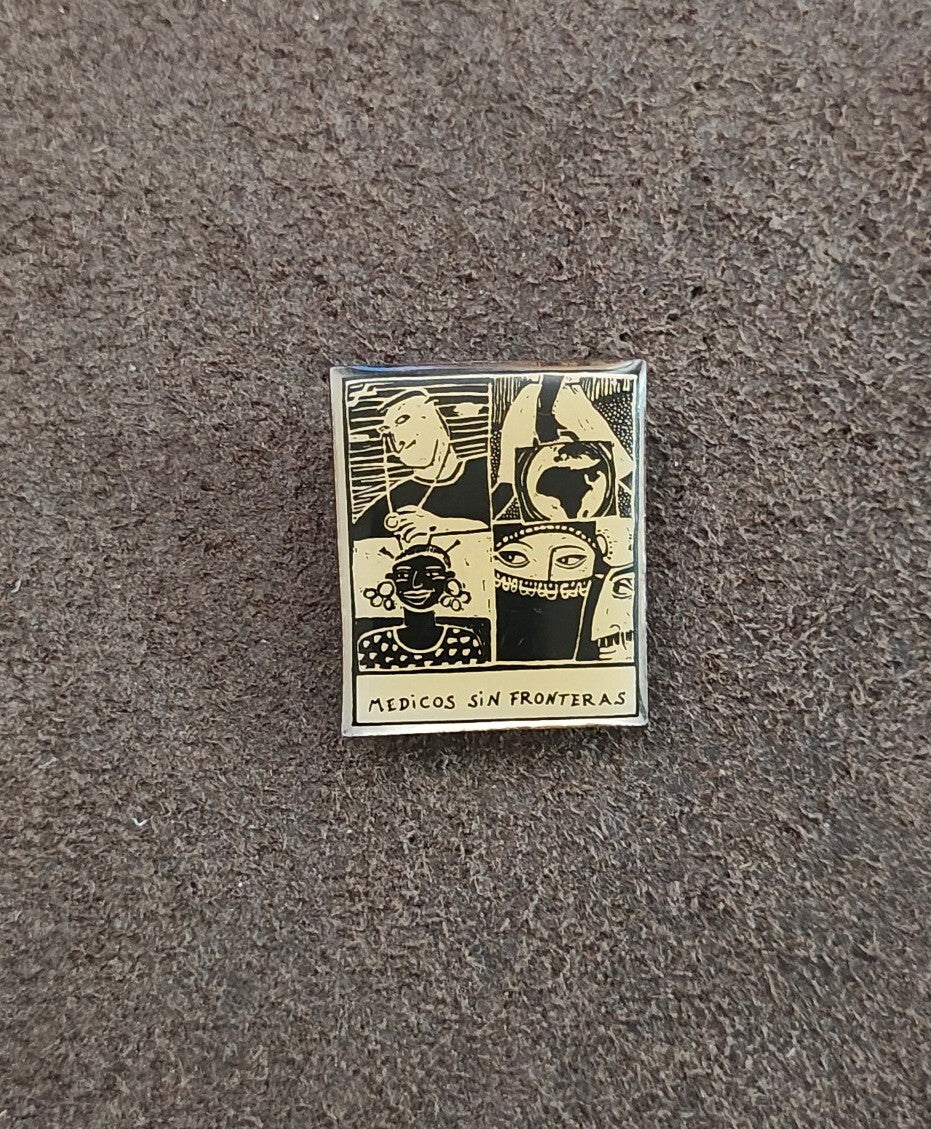 1990s Médicos Sin Fronteras (Doctors Without Borders) Silver Tone Enamel Pin