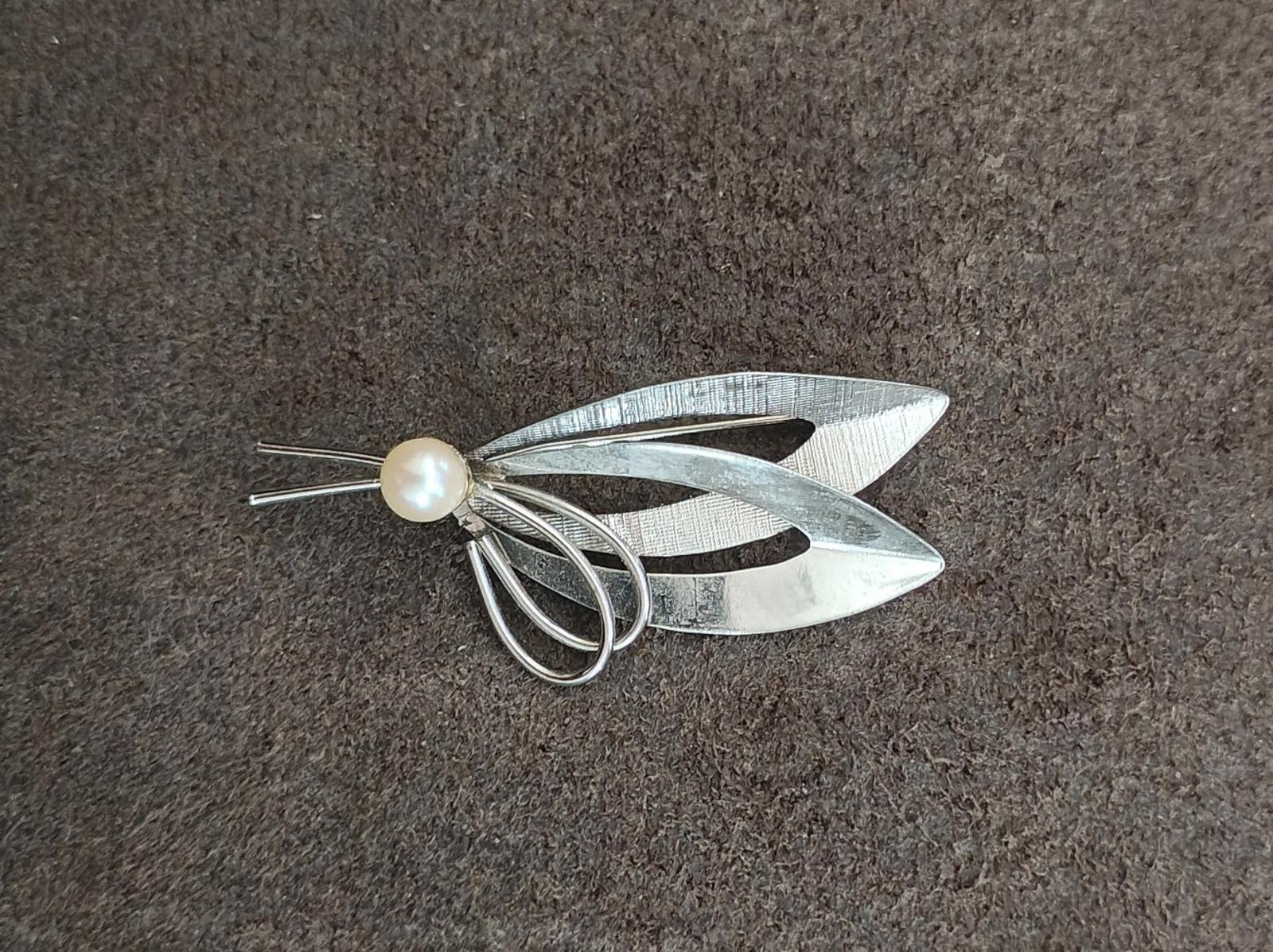 Sterling silver brooch with cultured pearl and layered leaf motifs, pin attachment visible