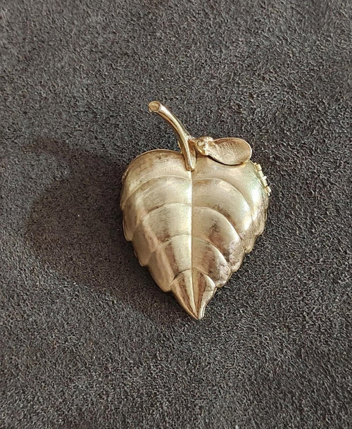 Gold tone leaf locket brooch, textured brushed finish with small loop top