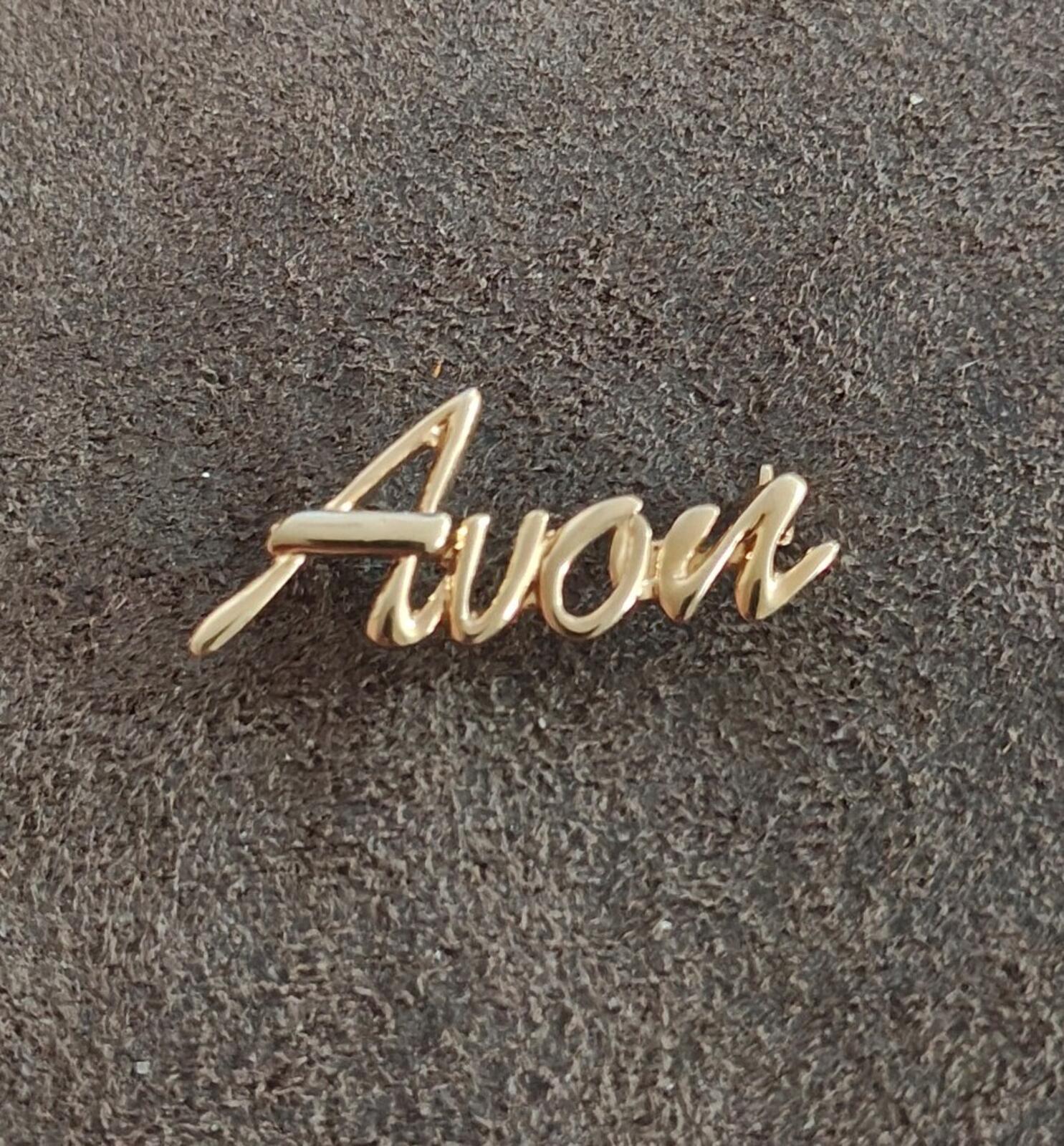 1980s/90s  Avon Gold Tone Cursive Logo Pin