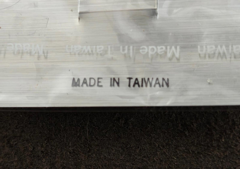Brooch card shows 'MADE IN TAIWAN' text on the back