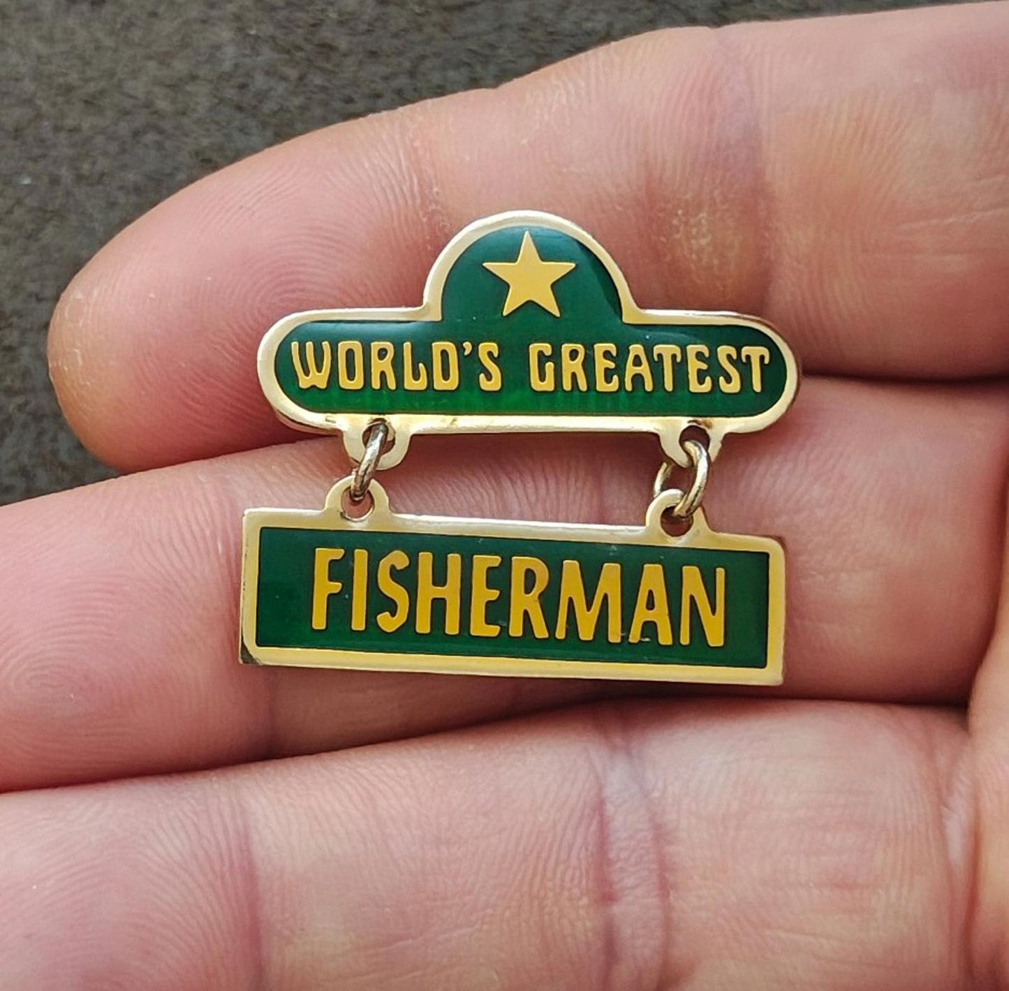 1970s "Worlds Greatest Fisherman Gold Tone Green Enamel Dangle Pin