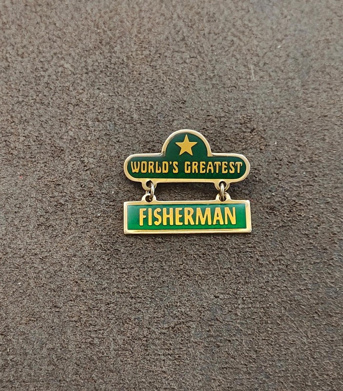 1970s "Worlds Greatest Fisherman Gold Tone Green Enamel Dangle Pin