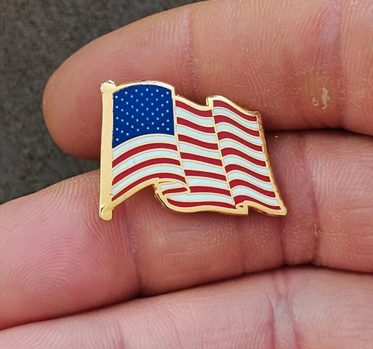 1980s Patriotic Gold Tone Enameled American Wavy Flag Pin.
