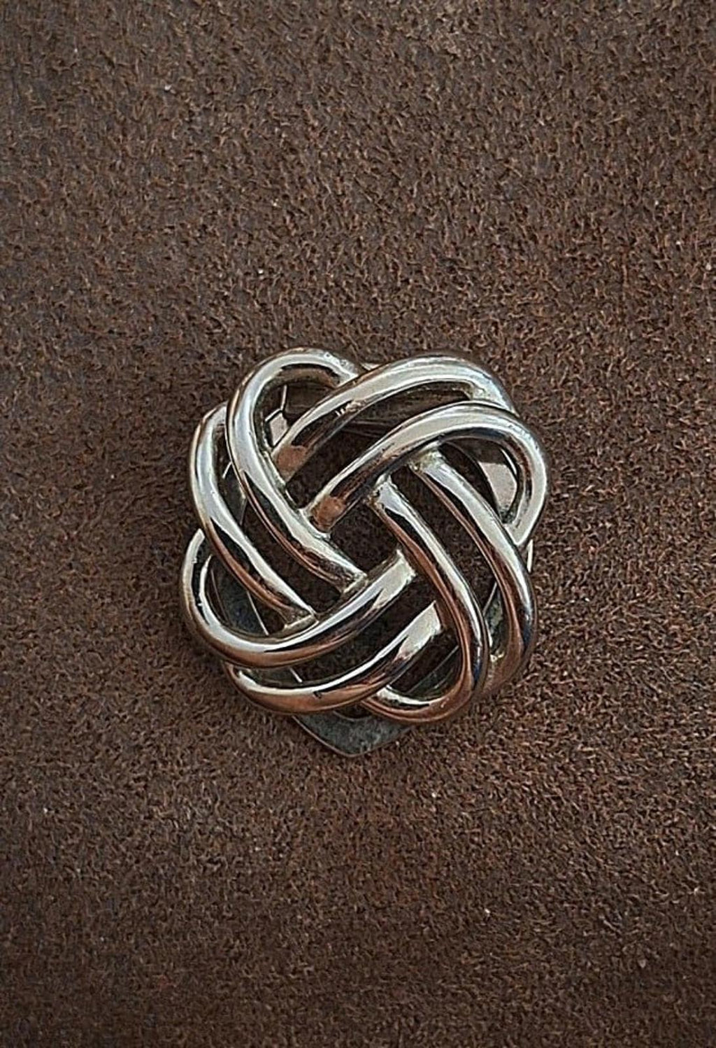 Silver love-knot scarf clip, compact round knot design with shiny edges