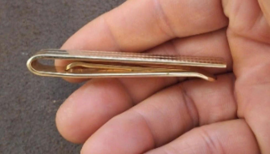 Gold tone tie bar clip back with safety pin loop and straight bar