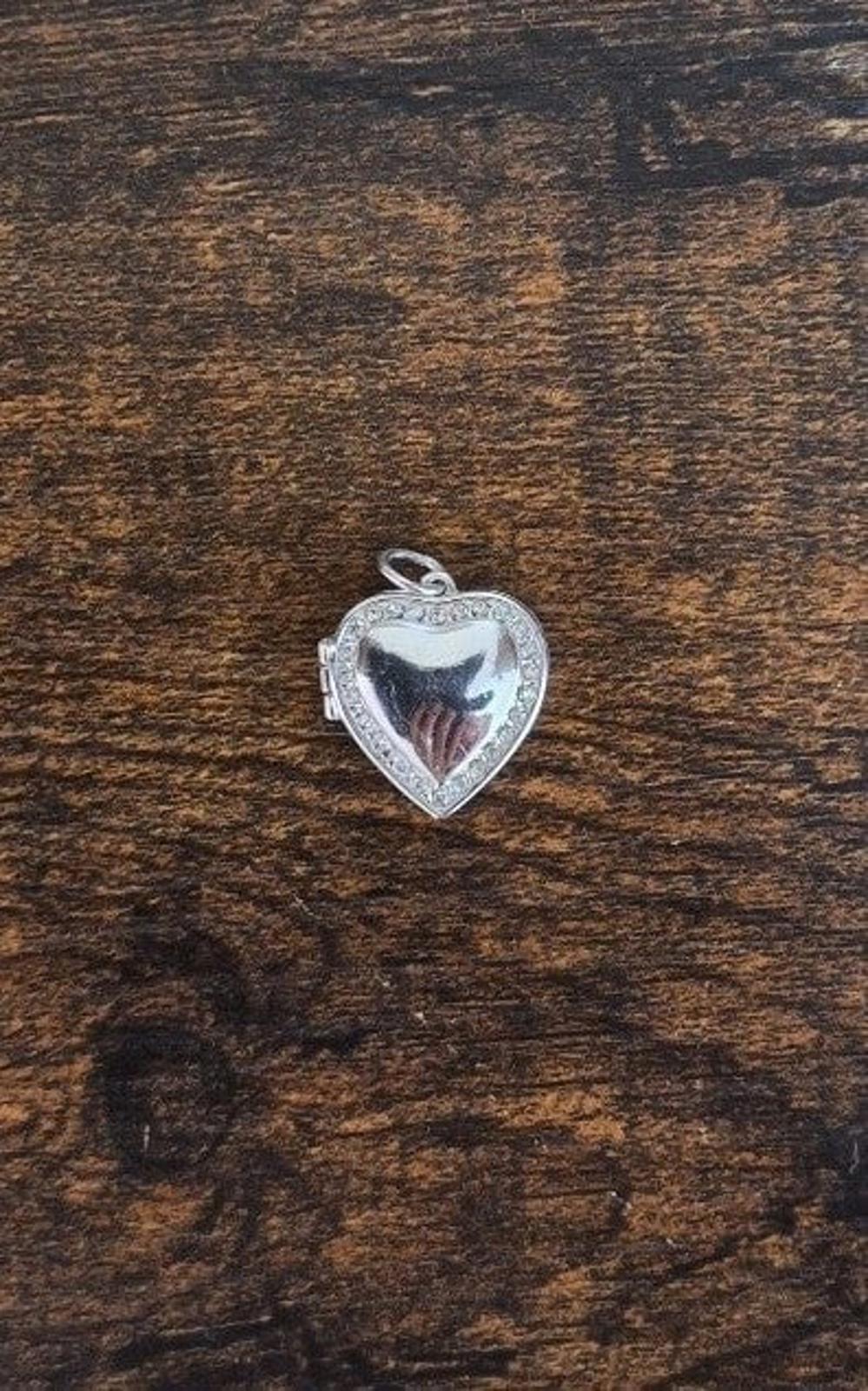 2004 Avon Silver and Clear Rhinestones Heart Locket Pendant